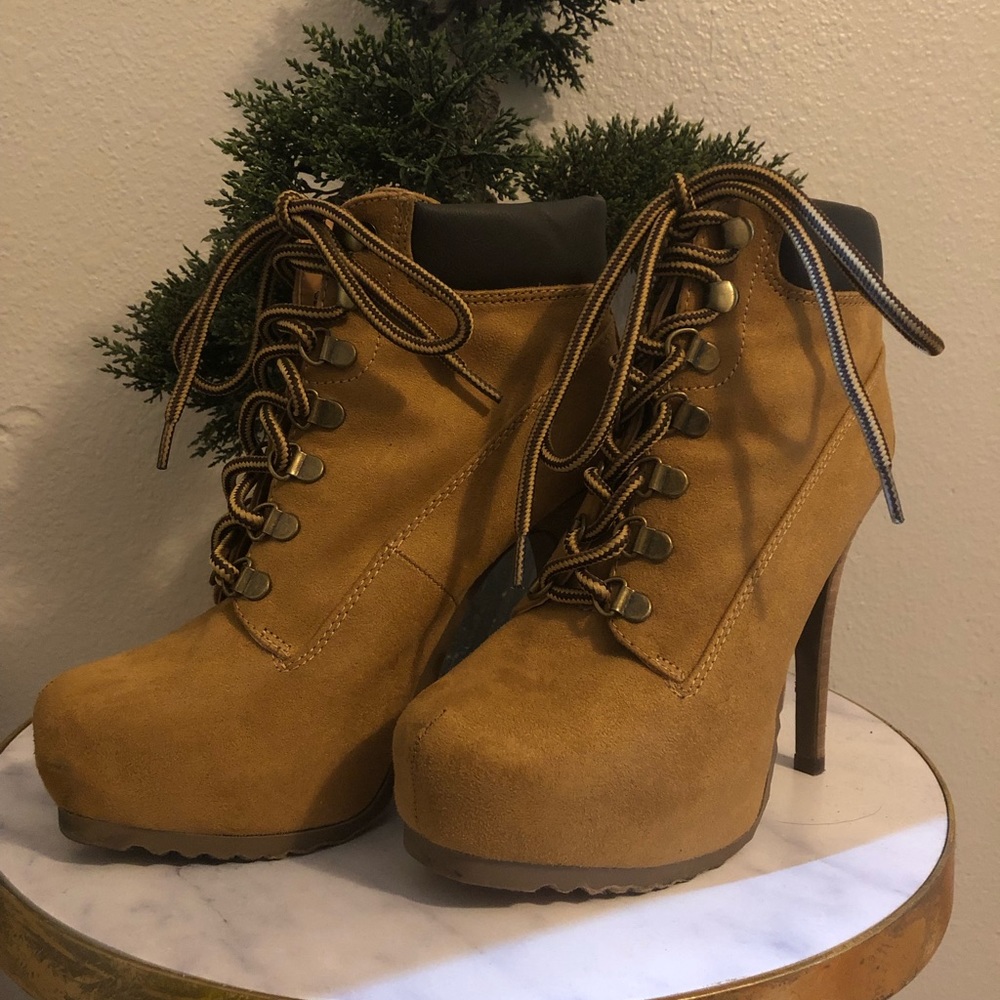 Tan lace up heels boots construction boot look